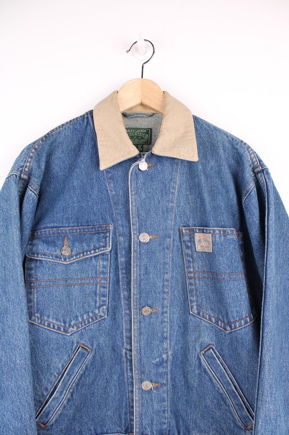 Ralph Lauren Country denim jacket with corduroy collar and applique. Four front pockets, with &