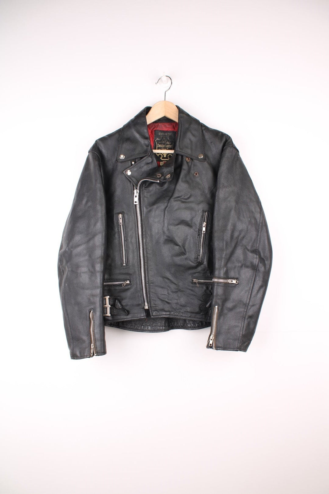 80s Campri Everest black leather biker jacket with four zip pockets and adjustable buckles on the hips.   