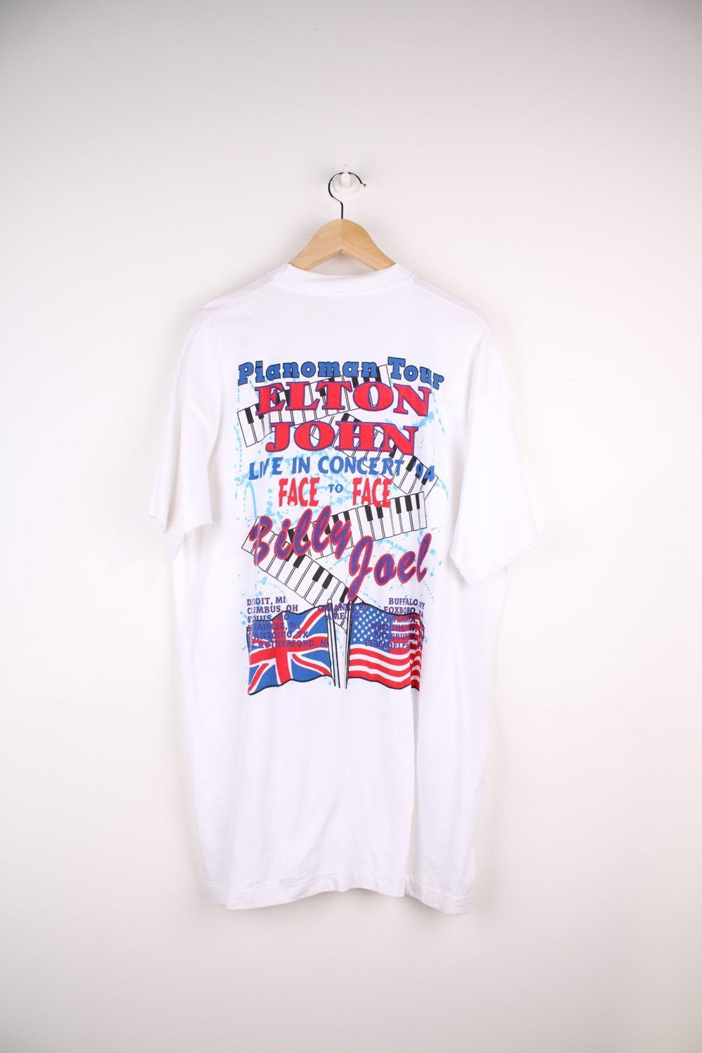  1994 Billy Joel & Elton John Face to Face Tour T-Shirt in a  colourway with a graphic print of them on the front and on the back all the tour dates and graphic printed.