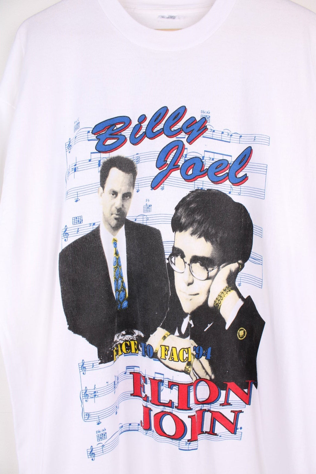  1994 Billy Joel & Elton John Face to Face Tour T-Shirt in a  colourway with a graphic print of them on the front and on the back all the tour dates and graphic printed.