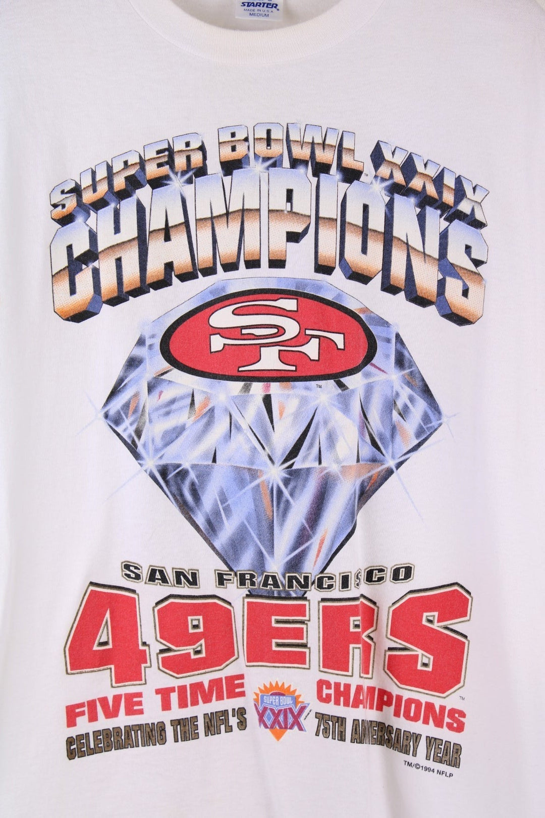  San Francisco 49ers 1994 Super Bowl Champions T-Shirt in a  colourway with the team logo, spell out and diamond graphic printed on front.