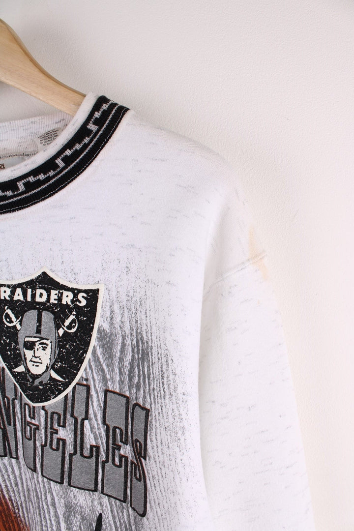 1993 Los Angeles Raiders  Sweatshirt in a  colourway with the team logo, spell out and graphic printed on the front.