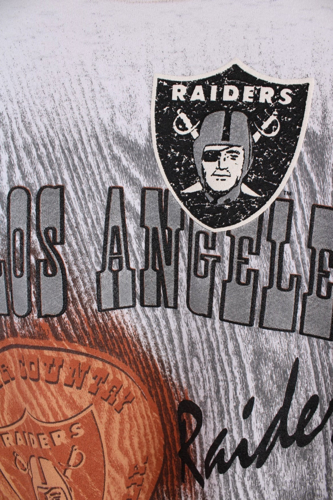 1993 Los Angeles Raiders  Sweatshirt in a  colourway with the team logo, spell out and graphic printed on the front.