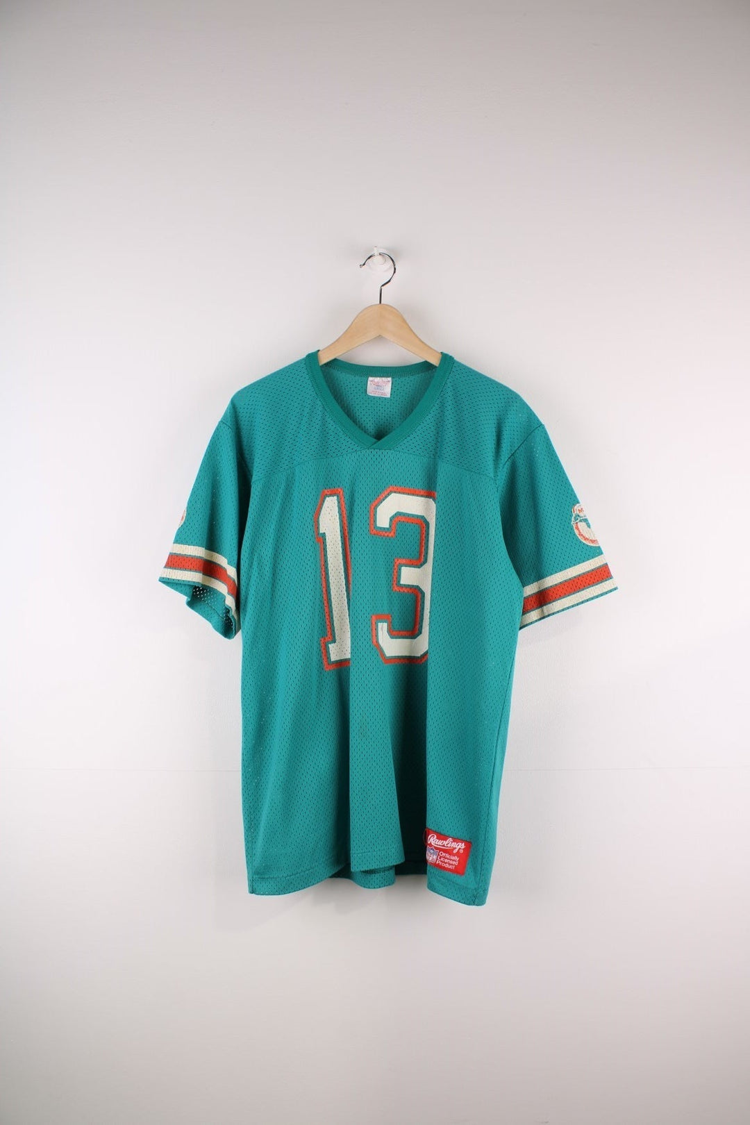 80's Miami Dolphins NFL Jersey in the blue team colourway, features printed number 13 and logo on the front, back and the sleeves.