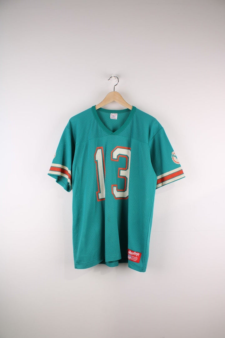 80's Miami Dolphins NFL Jersey in the blue team colourway, features printed number 13 and logo on the front, back and the sleeves.