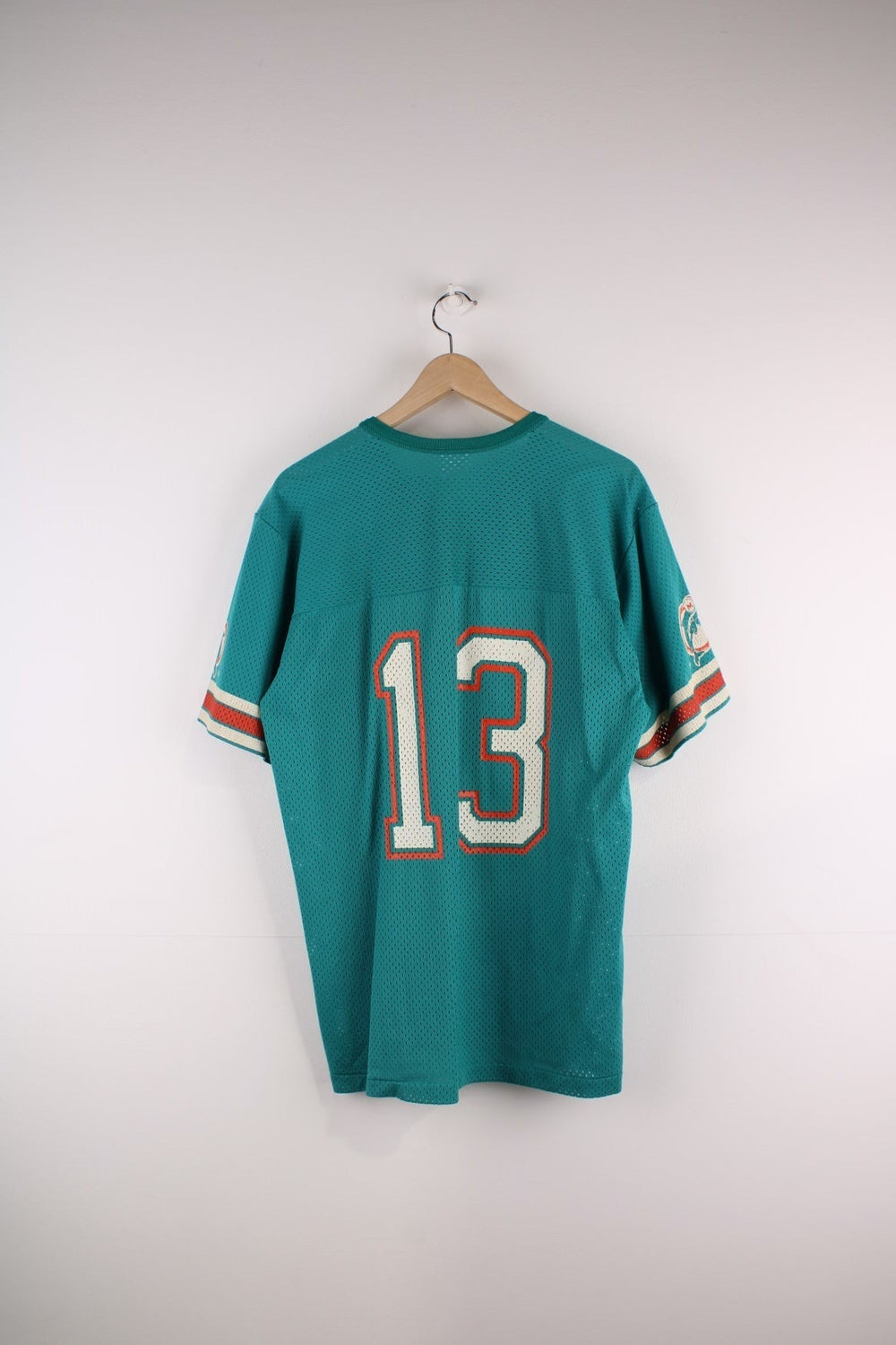 80's Miami Dolphins  Jersey in the  team colourway, features printed number 13 and logo on the front, back and the sleeves.