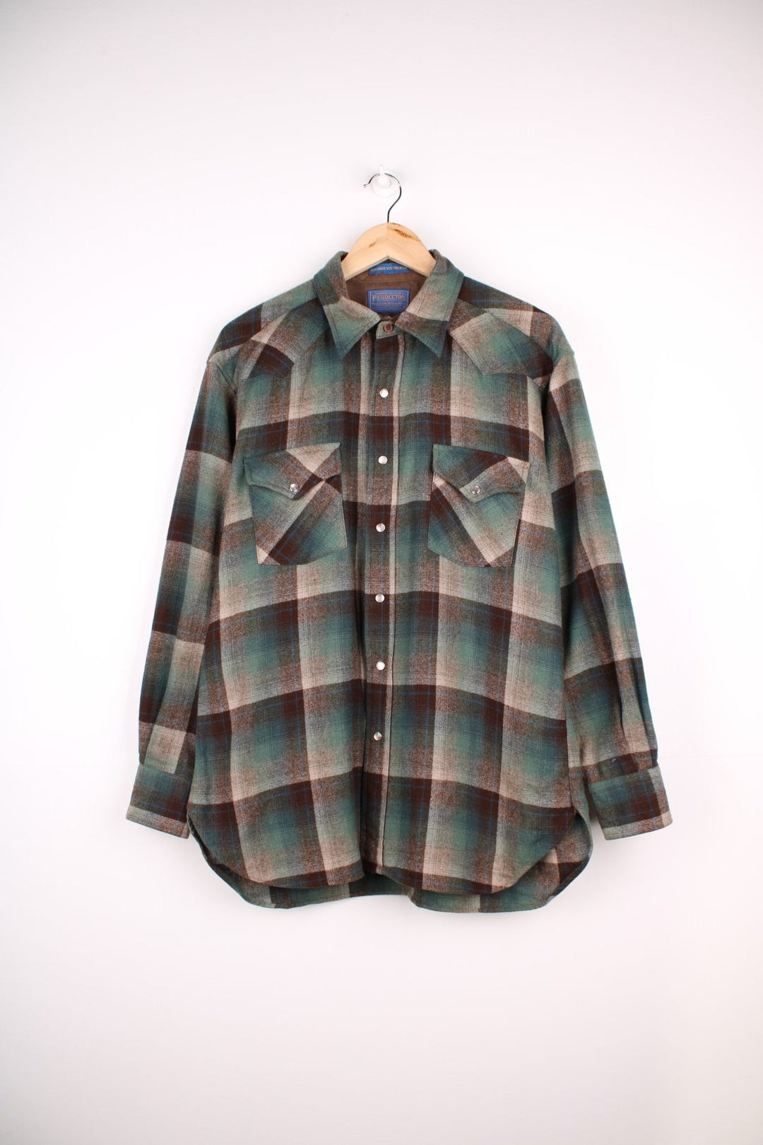 Pendleton Wool Shirt in a brown, blue and green plaid colourway, button up shirt with double chest pockets.