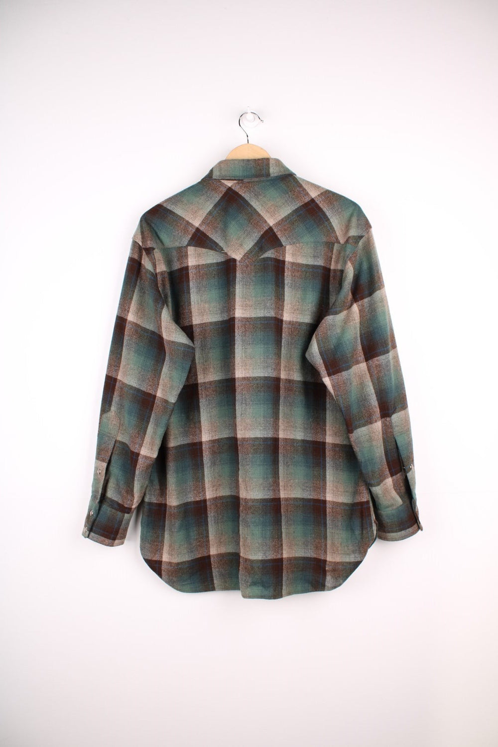  Wool Shirt in a , blue and green plaid colourway, button up shirt with double chest pockets.