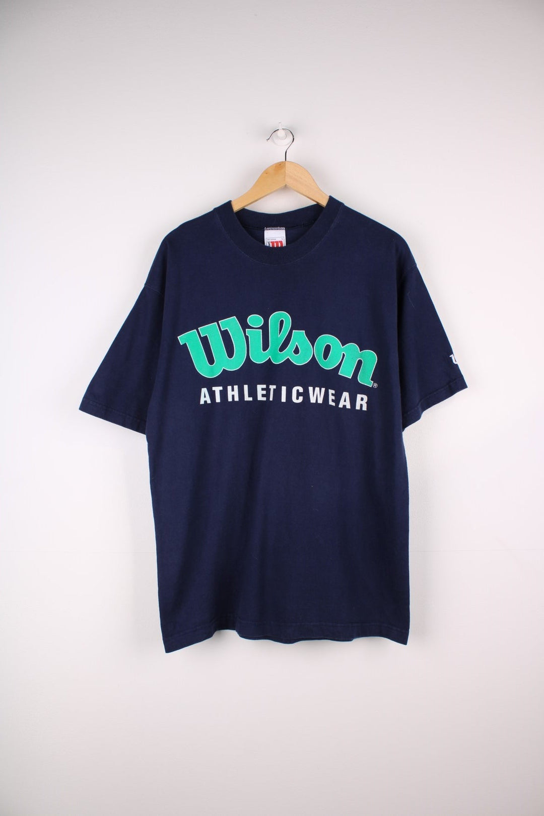 Vintage Wilson Athletic Wear T-Shirt in a blue colourway with the spell out logo printed across the front.