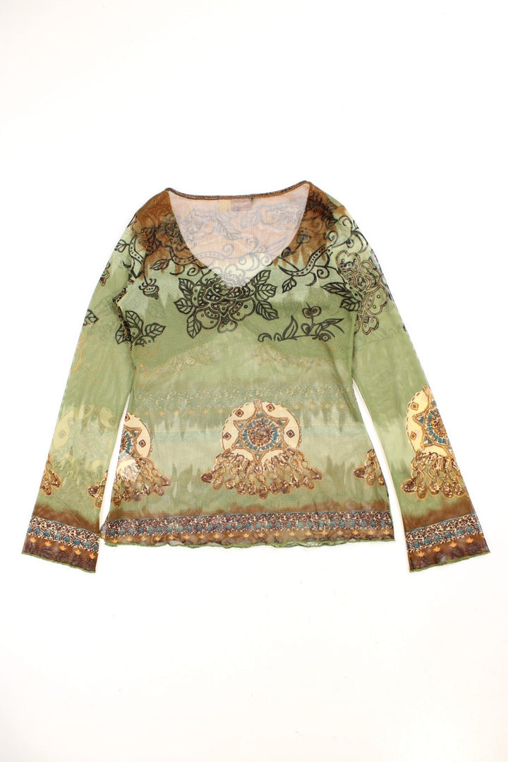 Y2K sheer boho top in green with floral patterns, lettuce hem and cuffs, a ruched bust, and a beaded decorative cord on the front.