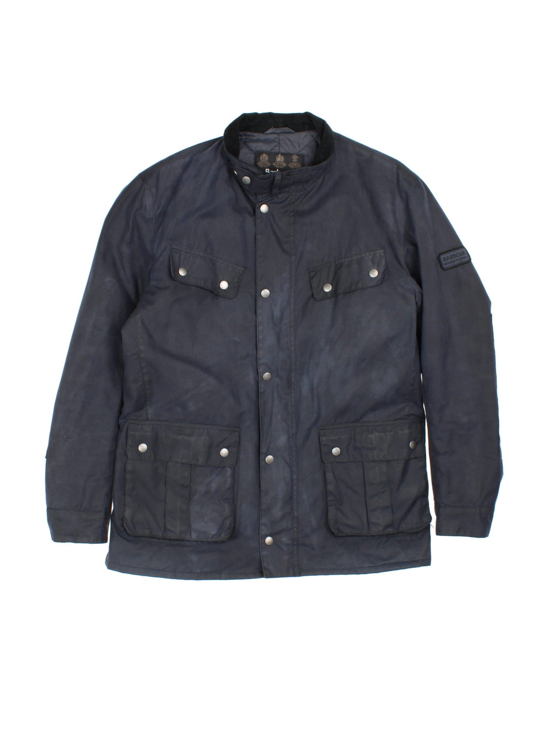 Barbour International Duke Jacket in a blue colourway, zips and buttons up, has multiple pockets, insulated with a quilted lining, and has the logo embroidered on the front and on the left sleeve.