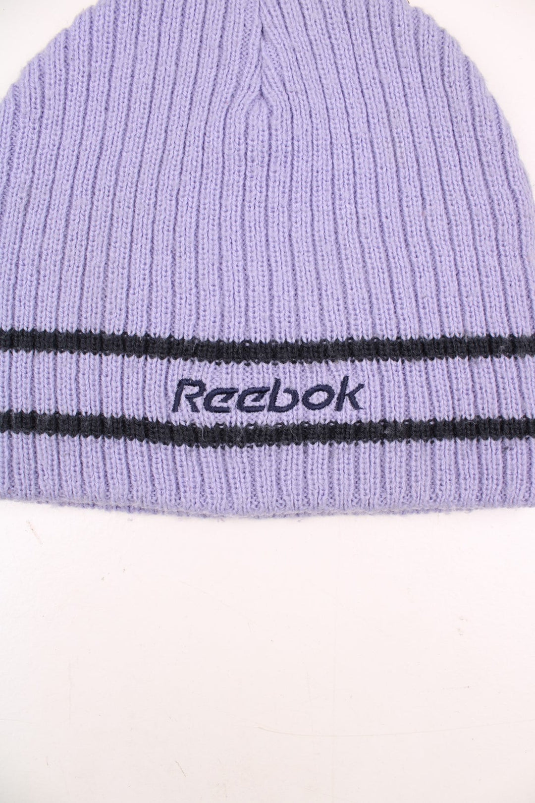 Y2K Reebok knitted beanie hat in lilac colourway. Features embroidered spell-out logo on the front