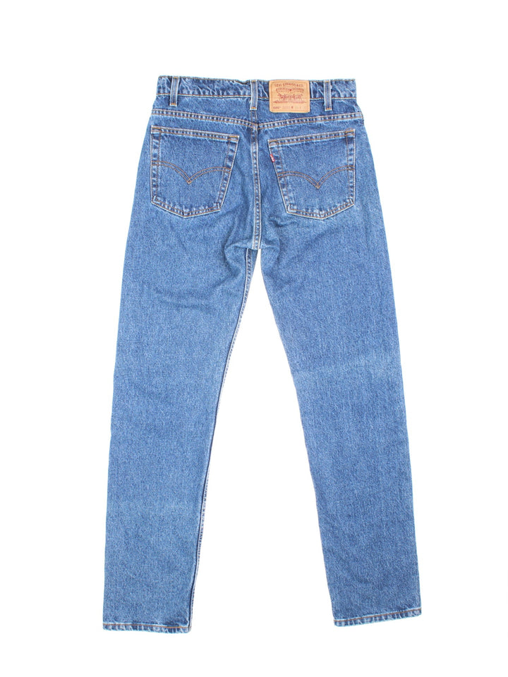 Levi Strauss 502 jeans in a mid blue wash with four pockets, zip and button closure, and a logo patch on the back.