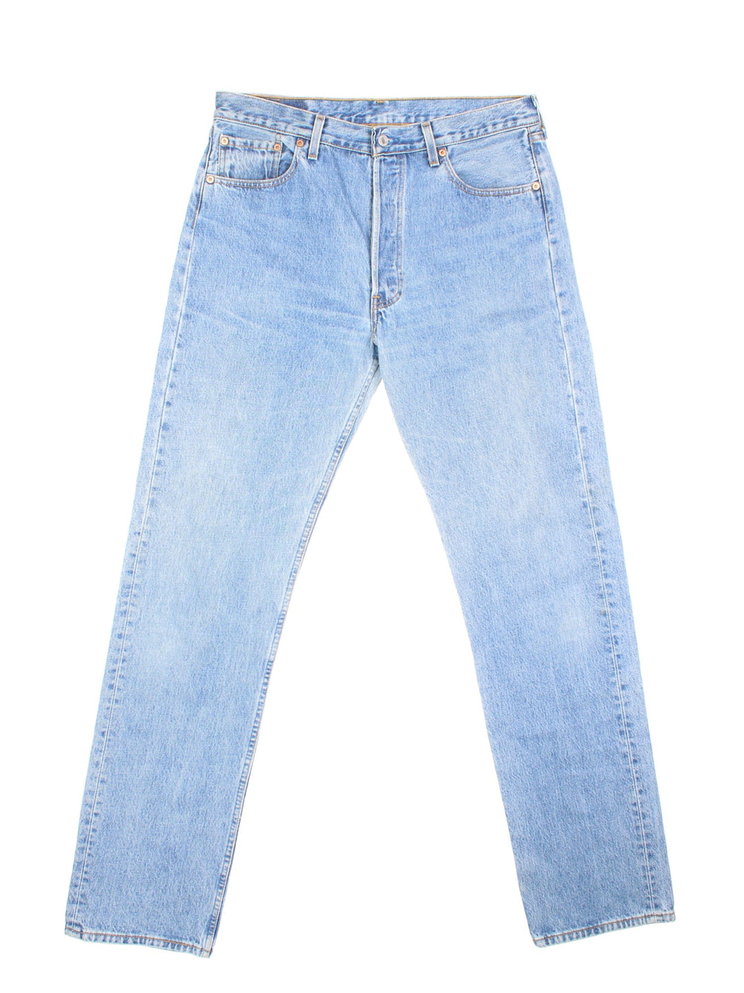 Levi Strauss jeans in a light blue wash with four pockets, zip and button closure, and a logo patch on the back.