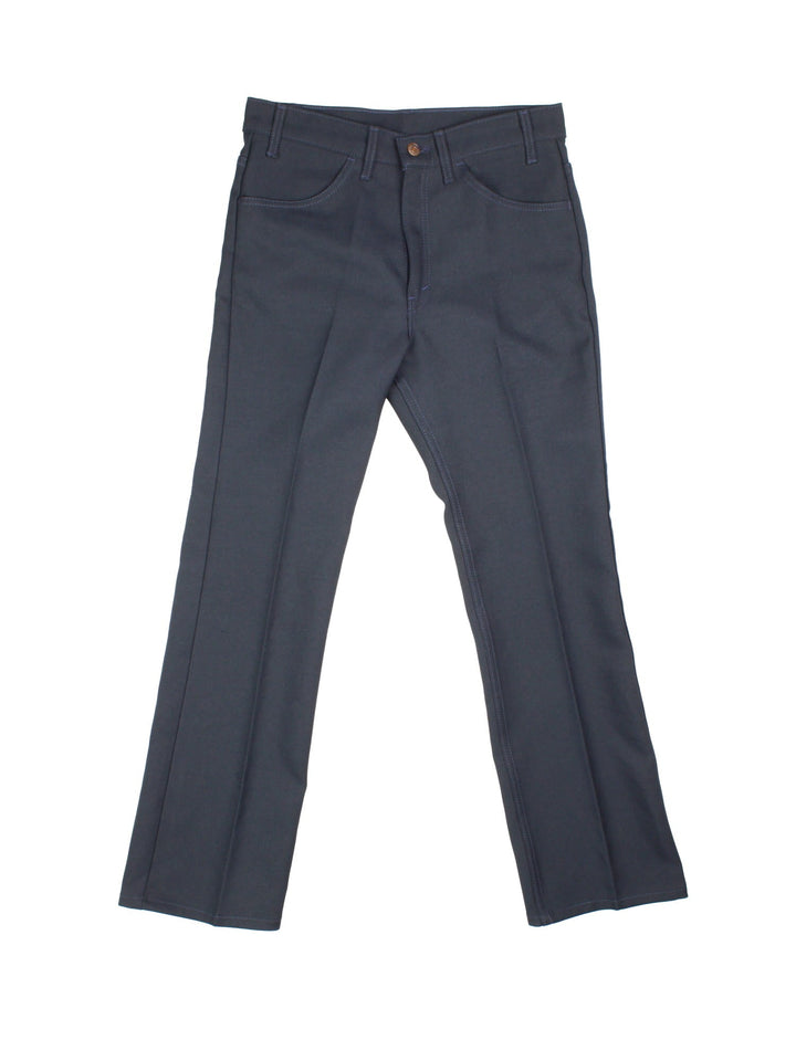 Levi Strauss 517 Sta-Prest black tab trousers in black wash with four pockets, zip and button closure, and a black tab on the back.