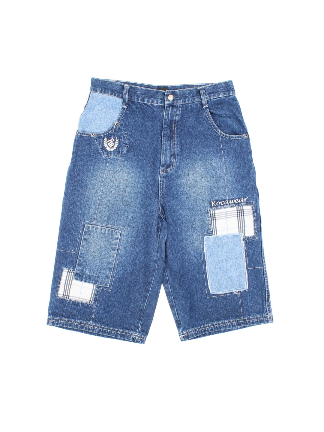 Y2K Rocawear patchwork denim shorts in blue  with four pockets, zip and button closure, several embroidered logos and a logo patch on the back.