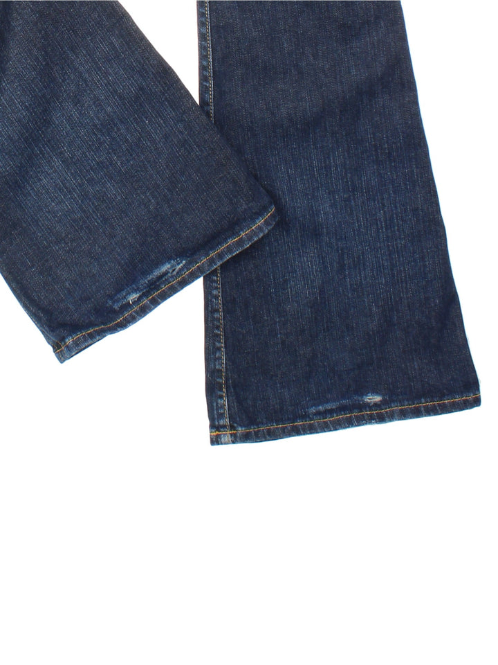  Y2K Hudson Flared Jeans in  colourway. Low waisted fit with zip up fly, flared leg and embroidered logo patch on the back.