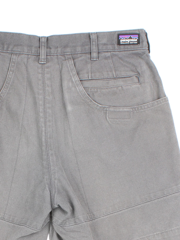 Patagonia Shorts in grey colourway with large back pockets and branded patch on back waistband.