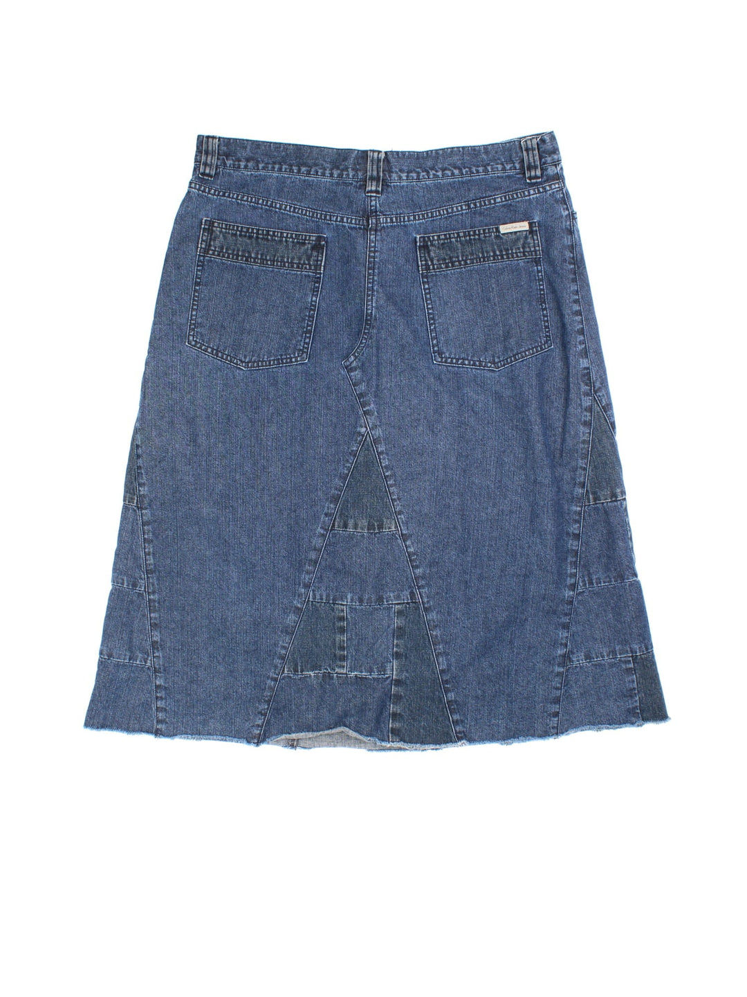 Y2K Calvin Klein Denim Skirt in blue colourway. Button/zip fastening, multi denim panel detailing and branding on back pocket.