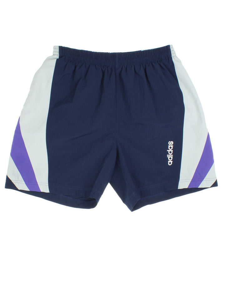 Adidas Sport Shorts in a blue colourway elasticated waist, side pockets and logo on right leg.