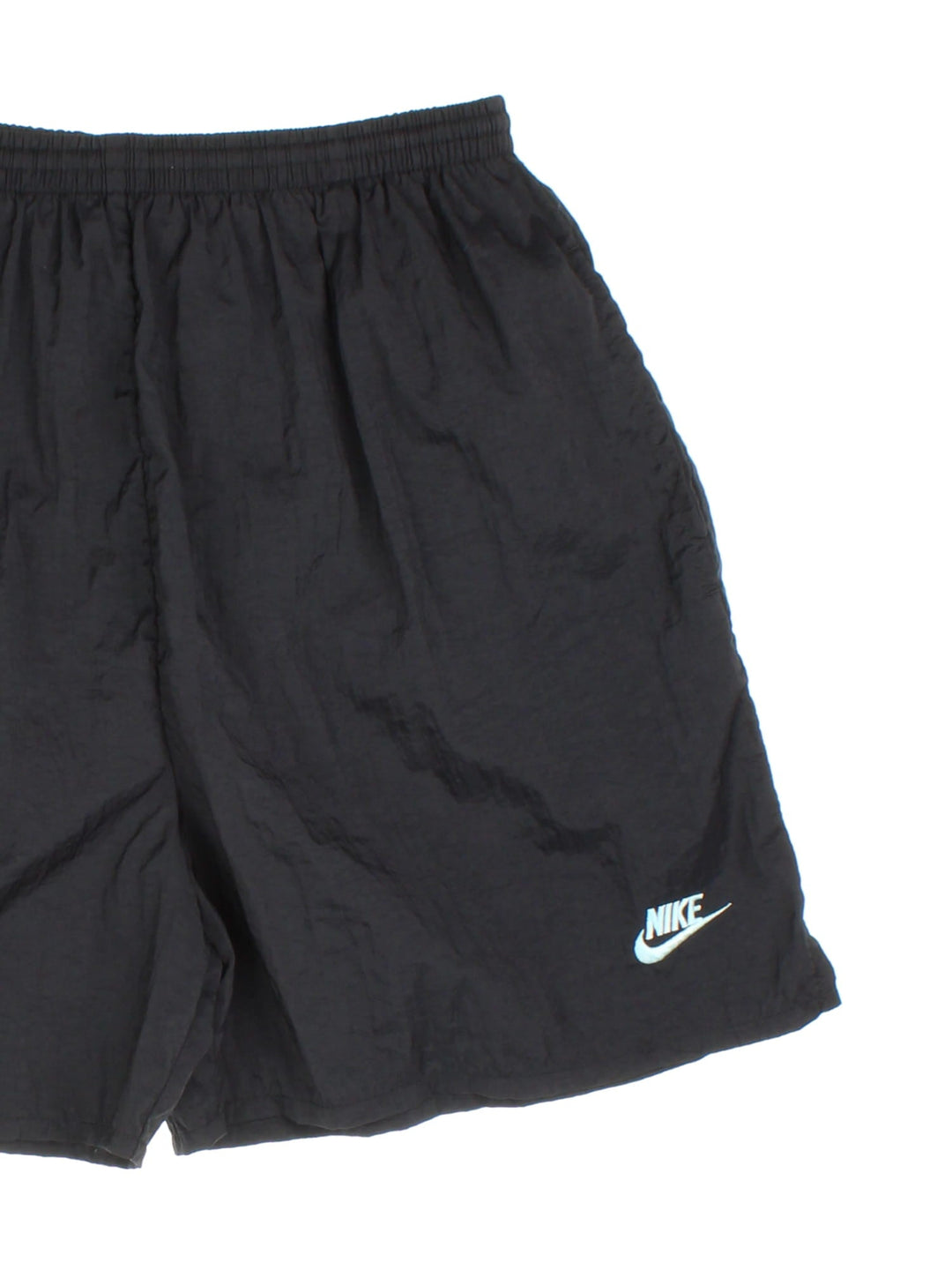 Nike Sport Shorts in a black colourway elasticated waist, side pockets, and has the logo branding on the front and back.