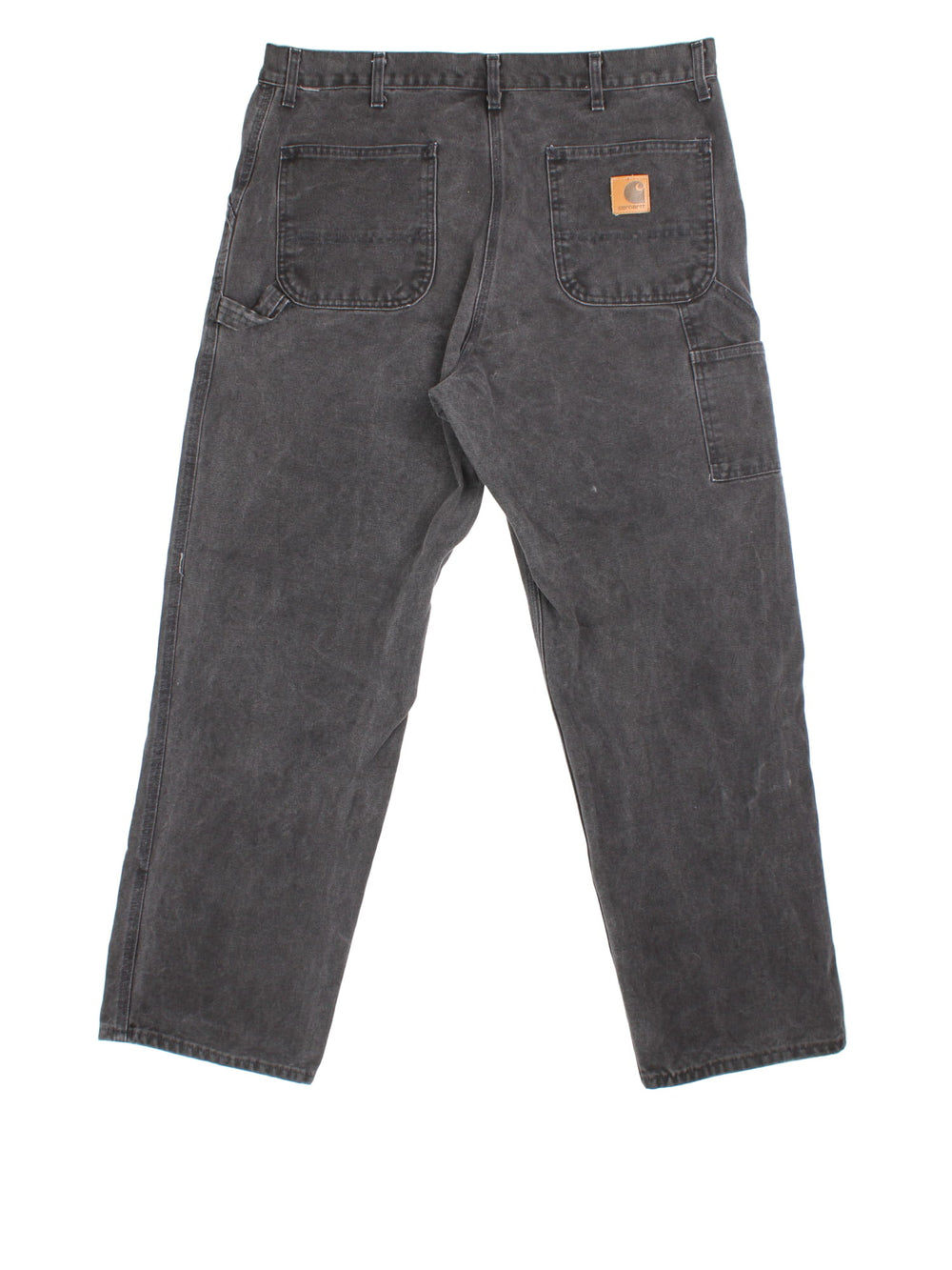 Carhartt Carpenter Jeans in a black colourway, with multiple pockets and leather logo on the back pocket.