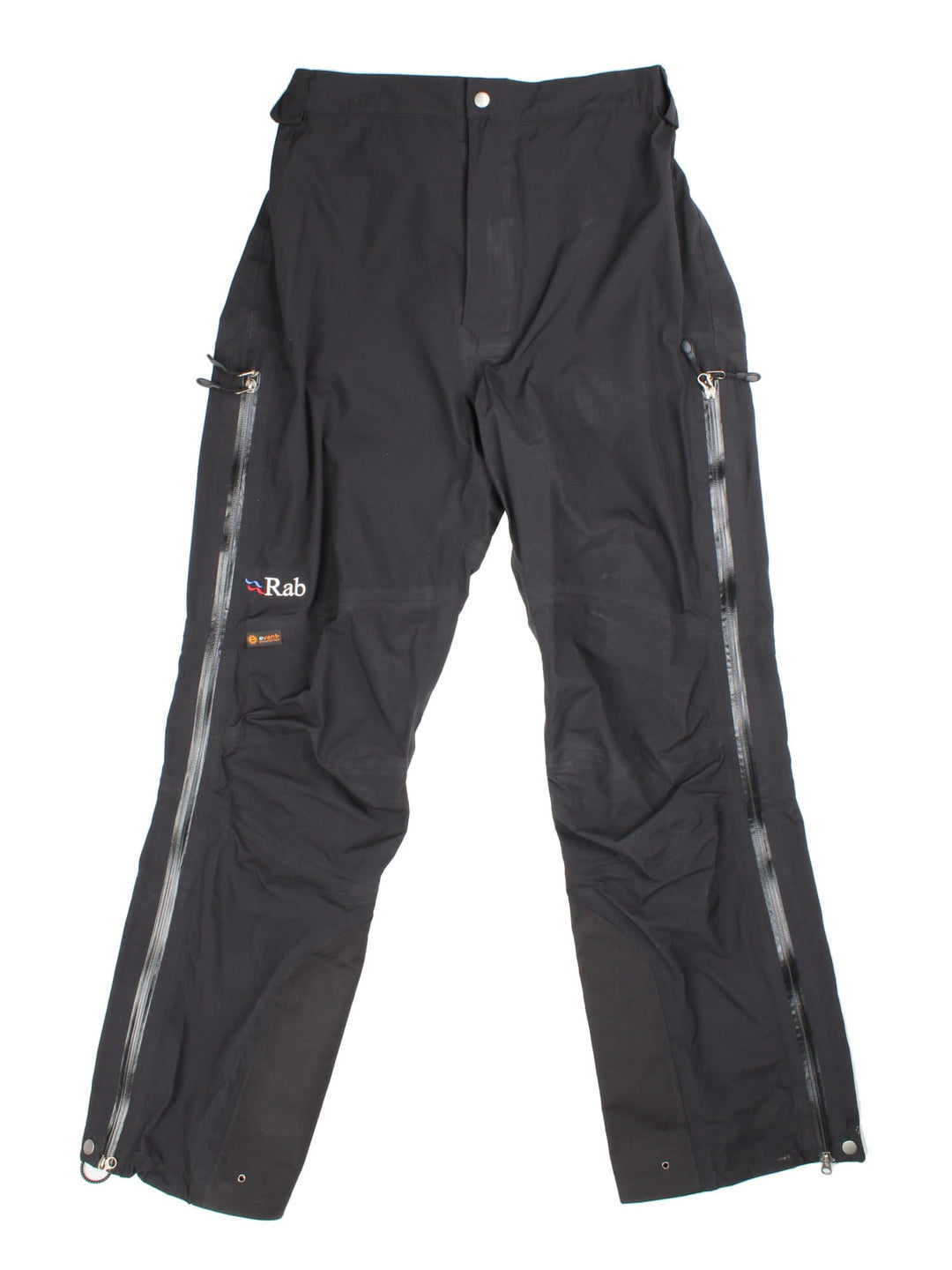 Vintage Rab hydroshell trousers in black colourway. Zip/popper fastening with double way zip down legs. Embroidered logo on front.