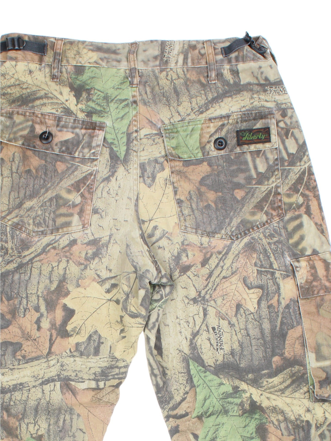 Vintage Camo Cargo Trousers in green and brown colourway with multiple pockets and the logo embroidered on the back.