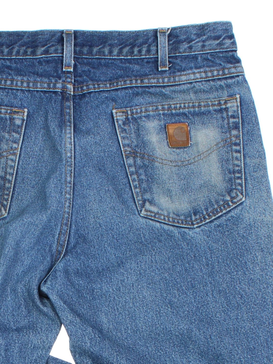 Carhartt Jeans in blue colourway with multiple pockets and the logo embroidered on the back.