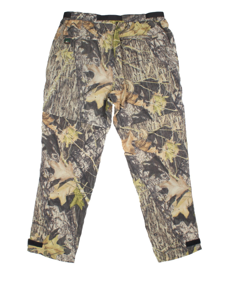 Vintage Real Tree Camo Trousers in green colourway with multiple pockets and zip off leg function.