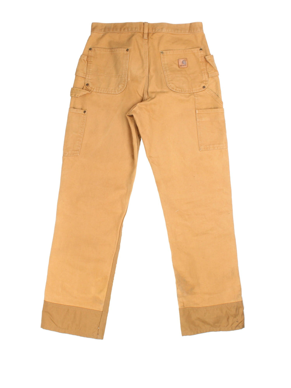 Carhartt Double Knee Jeans in multi tan colourway. Zip fly fastening with multiple pockets and leather patch branding.