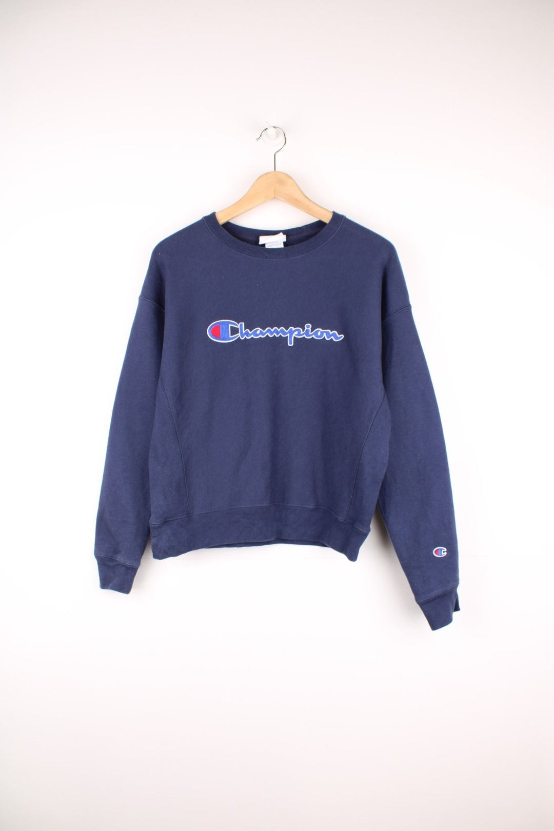 Champion Reverse Weave Sweatshirt in a blue colourway with the spell out logo embroidered across the front. 