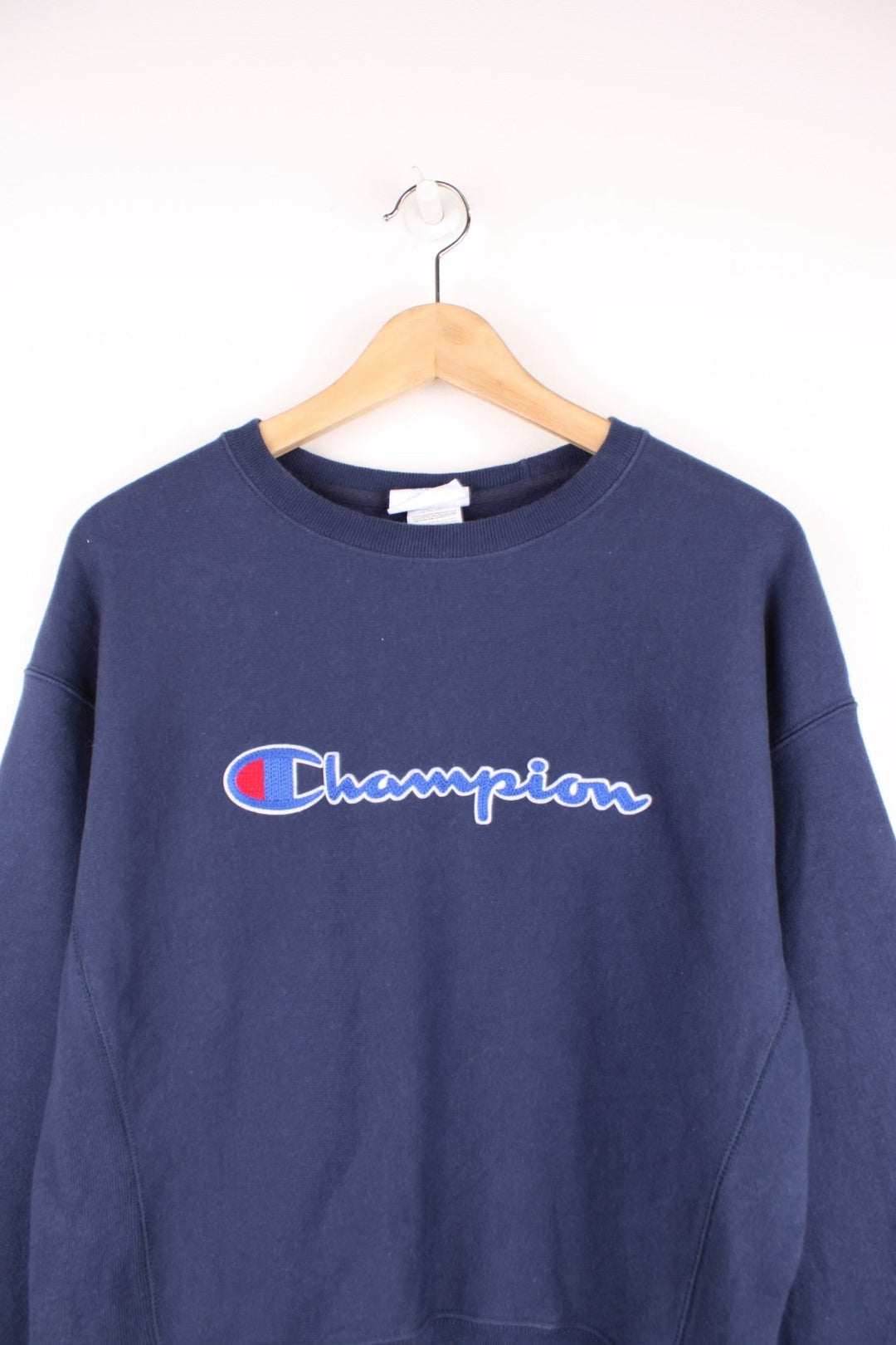 Champion Reverse Weave Sweatshirt in a blue colourway with the spell out logo embroidered across the front. 