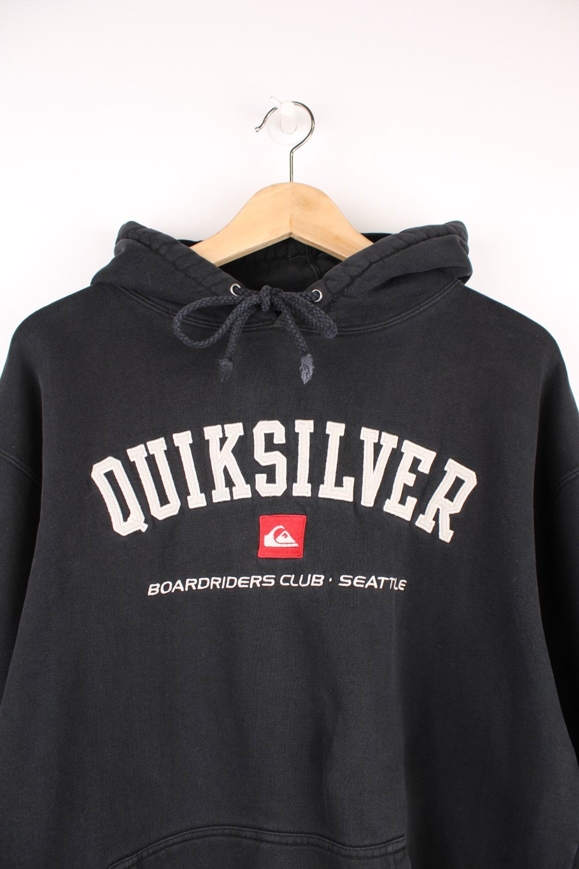 Quiksilver Hoodie in a black colourway with the spell out logo embroidered across the front. 