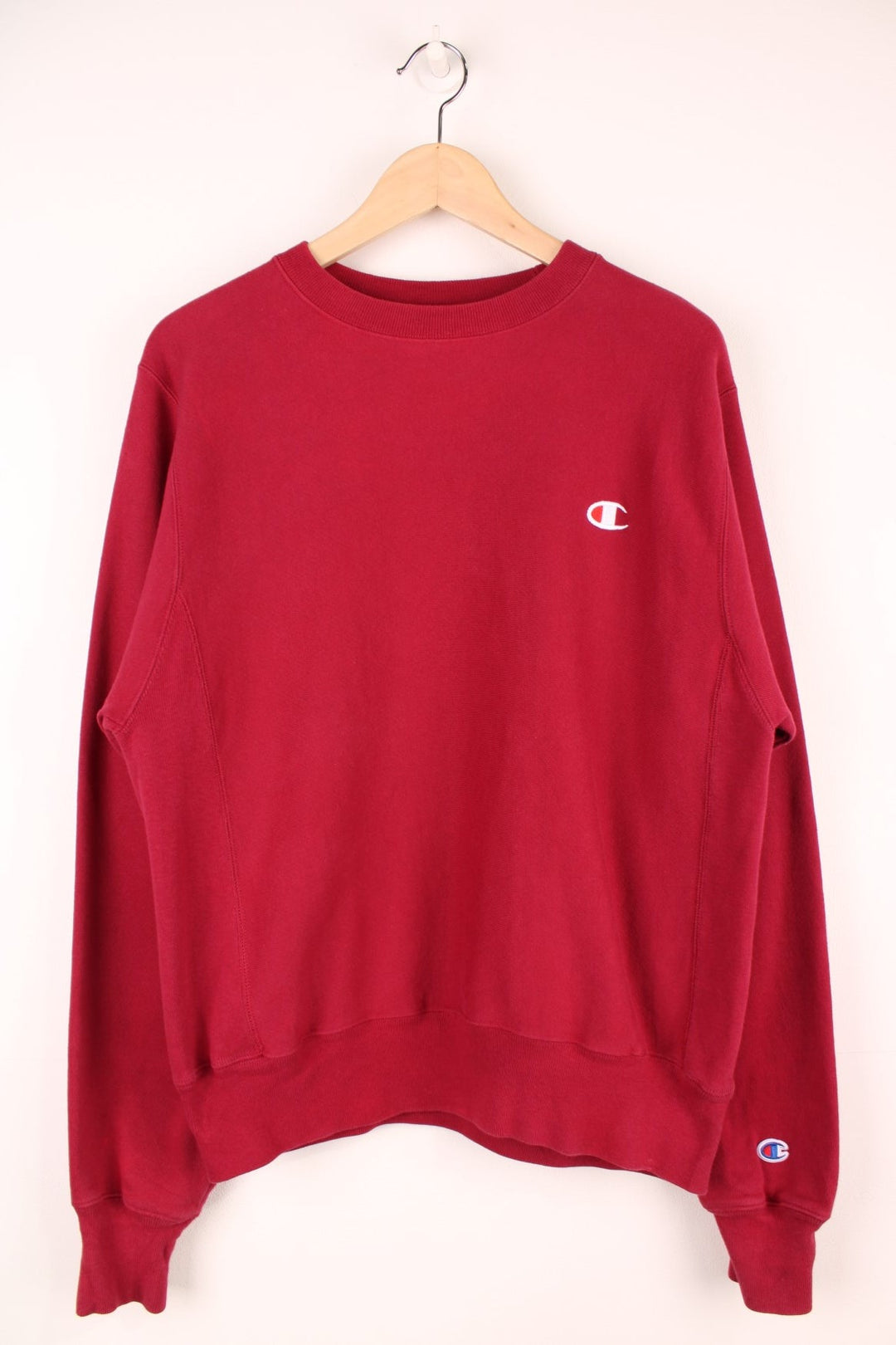 Champion Reverse Weave Sweatshirt in a burgundy red colourway with the logo embroidered on the chest. 