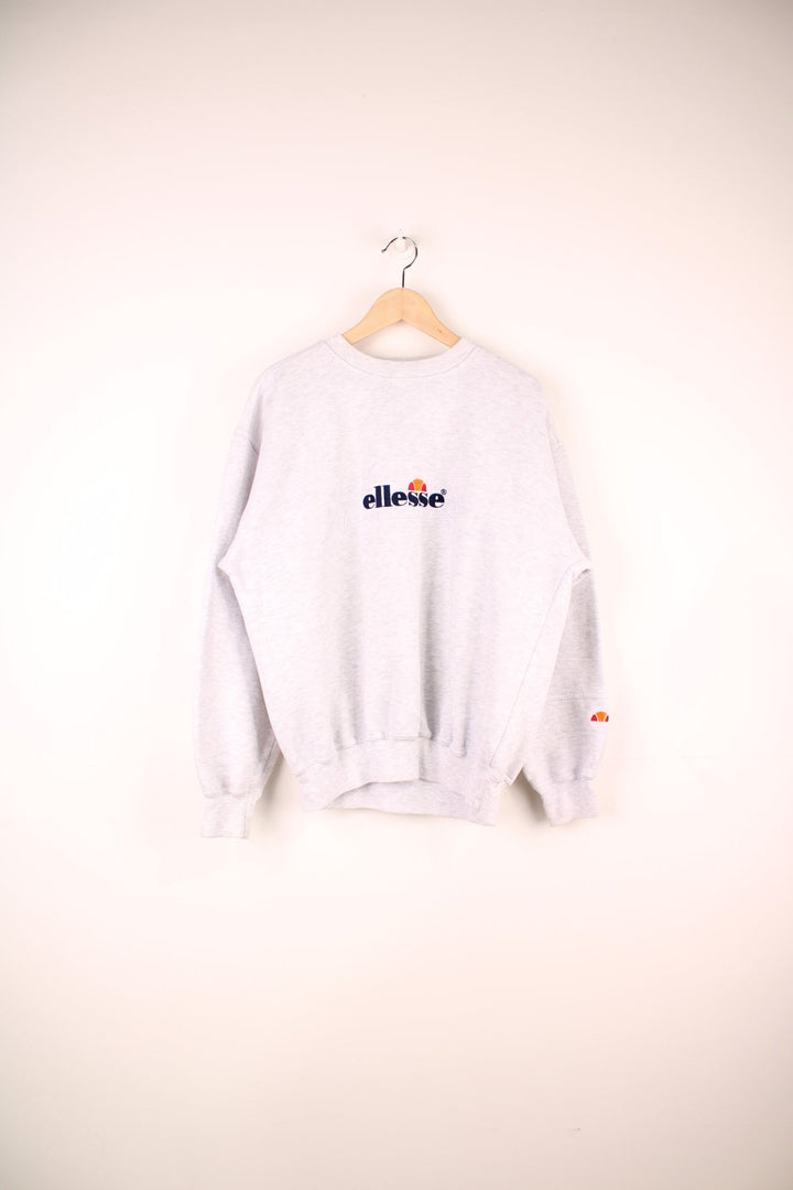 Ellesse Sweatshirt in a grey colourway with the spell out logo embroidered on the front.