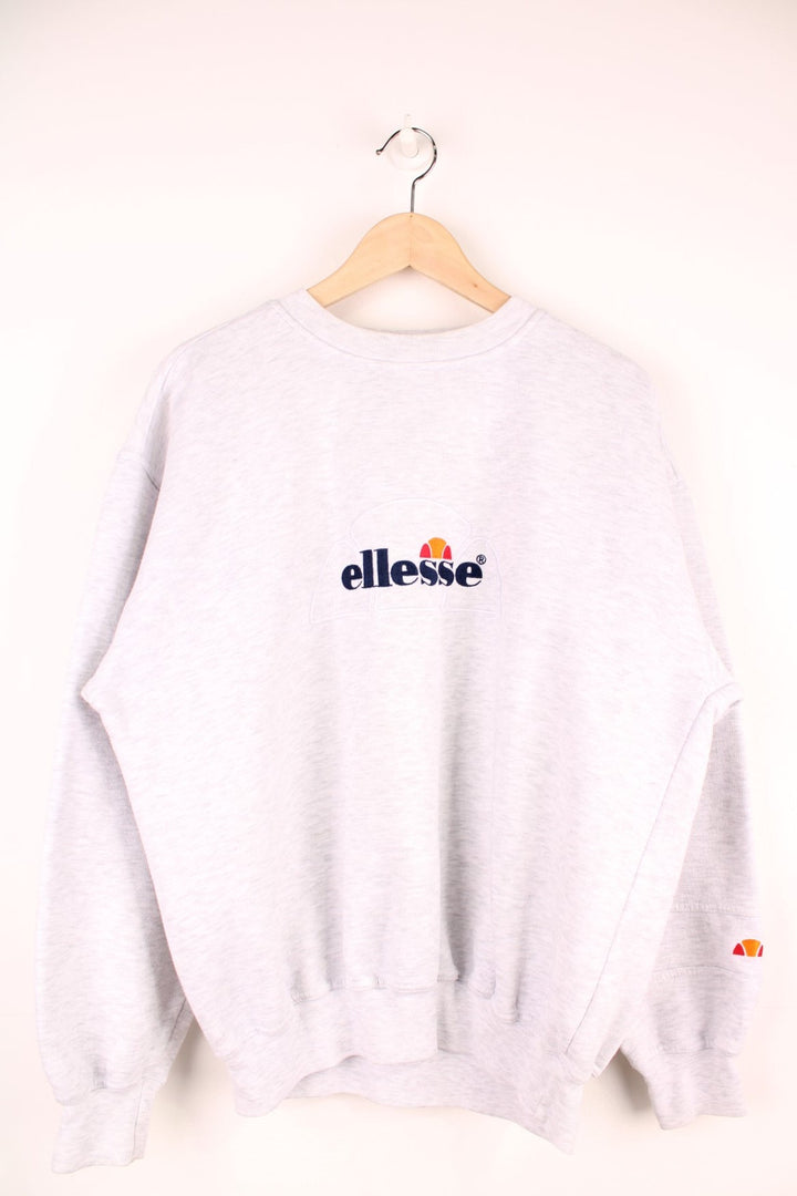 Ellesse Sweatshirt in a grey colourway with the spell out logo embroidered on the front.