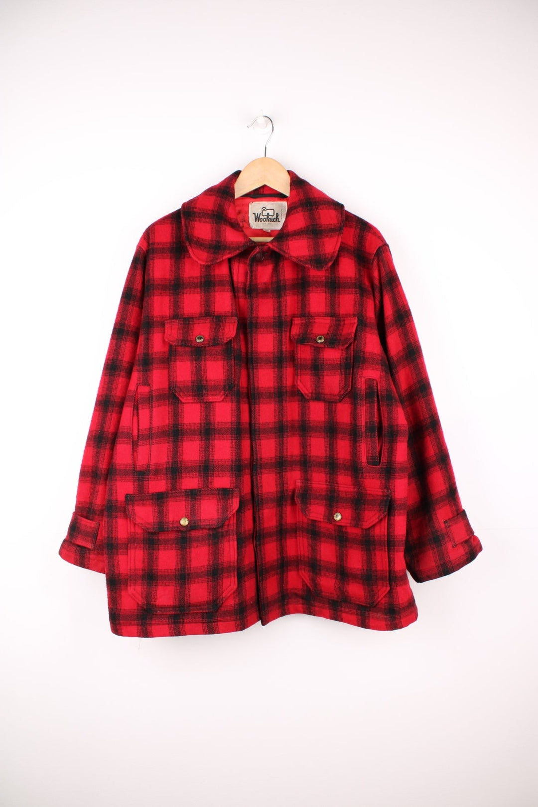 Vintage Woolrich Plaid Wool Coat in a red and black colourway, button up with a big collar and has multiple pockets. 