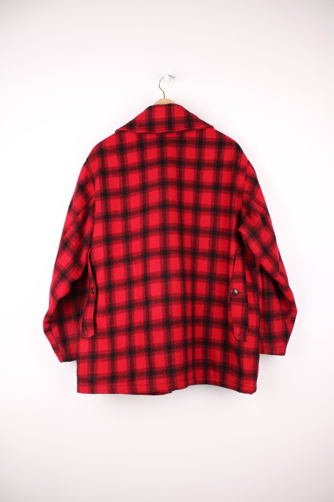 Vintage Woolrich Plaid Wool Coat in a red and black colourway, button up with a big collar and has multiple pockets. 