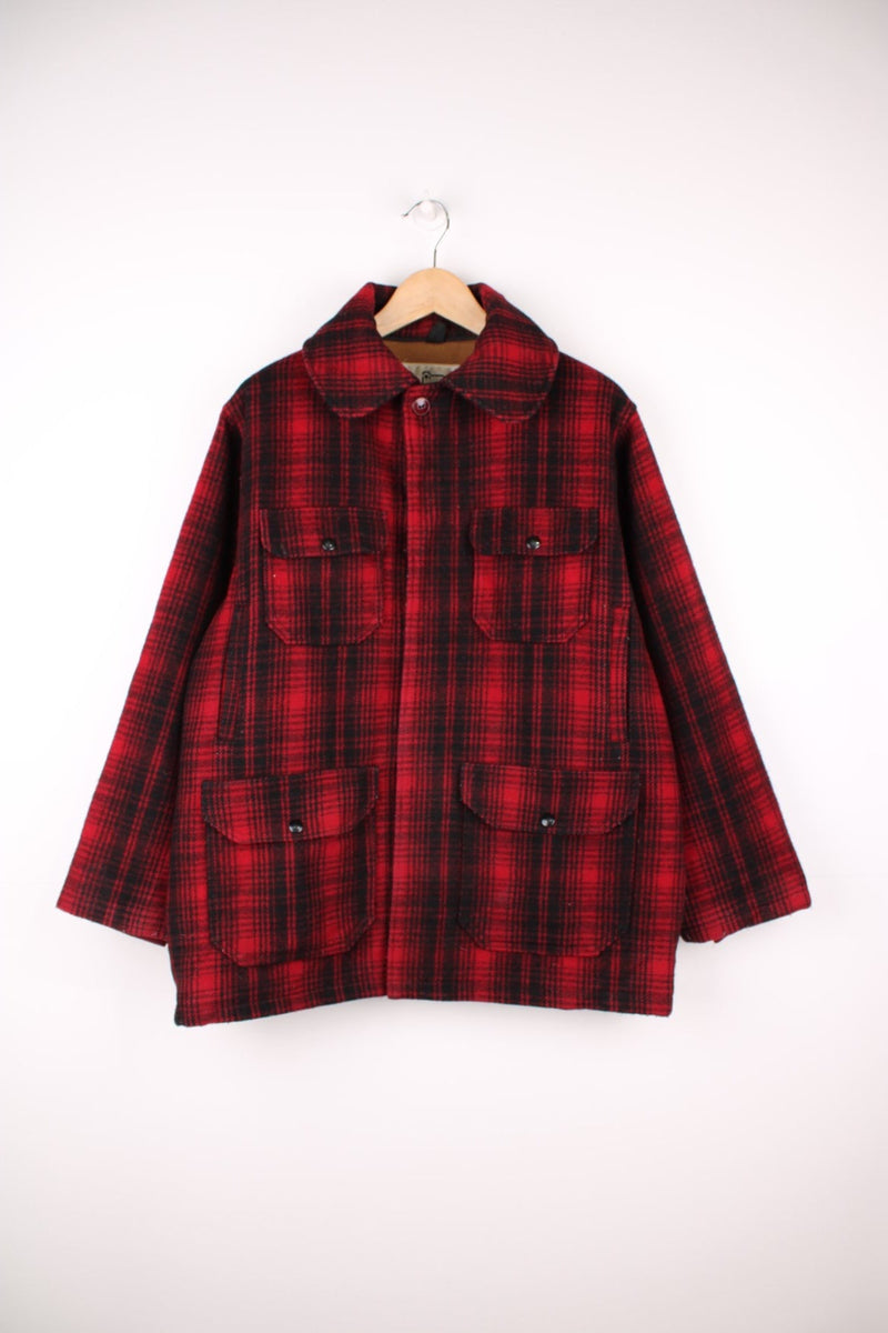 70's Woolrich Mackinaw Jacket in a red and black plaid colourway, button up with a big collar, and has multiple pockets. 