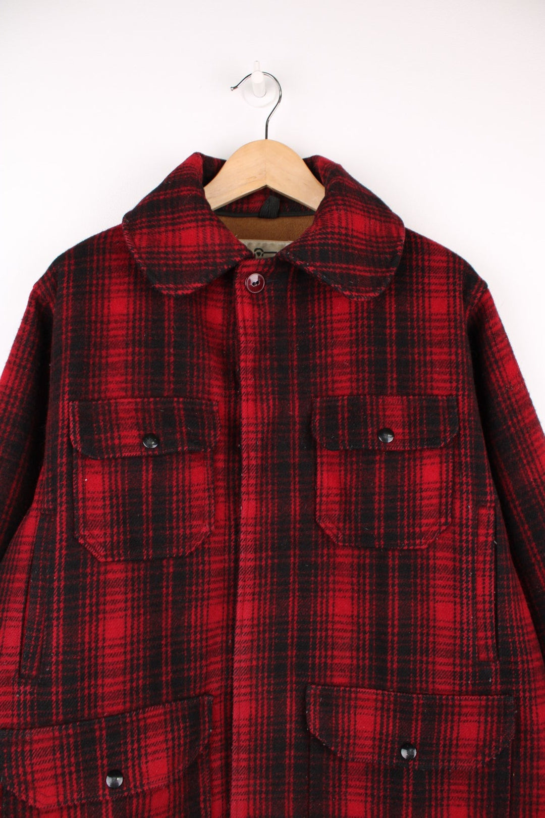 70's Woolrich Mackinaw Jacket in a red and black plaid colourway, button up with a big collar, and has multiple pockets. 