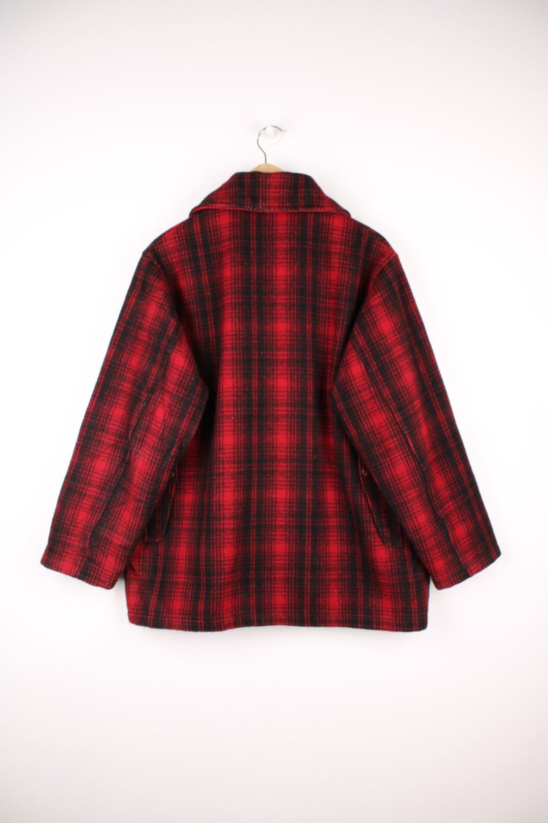 70's Woolrich Mackinaw Jacket in a red and black plaid colourway, button up with a big collar, and has multiple pockets. 