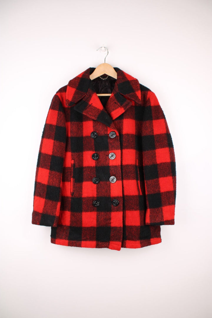 Vintage Cooper Plaid Peacoat in a red and black colourway, button up with side pockets, camp collar and has a nylon lining. 