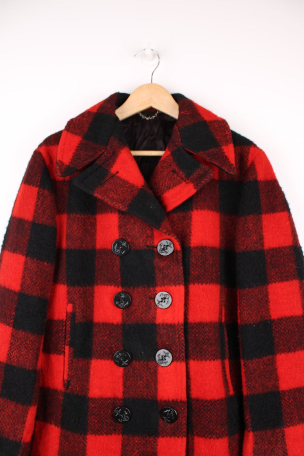 Vintage Cooper Plaid Peacoat in a red and black colourway, button up with side pockets, camp collar and has a nylon lining. 