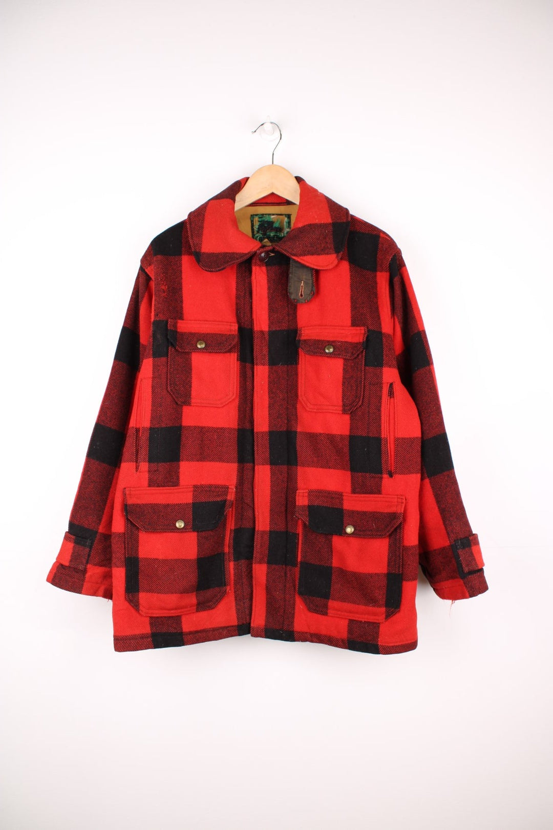 Vintage Woolrich Plaid Wool Coat in a red and black colourway, button up with a big collar and has multiple pockets.