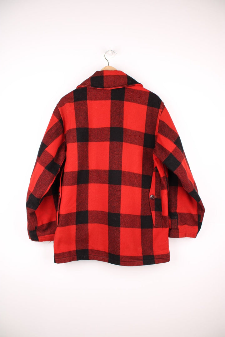 Vintage Woolrich Plaid Wool Coat in a red and black colourway, button up with a big collar and has multiple pockets.