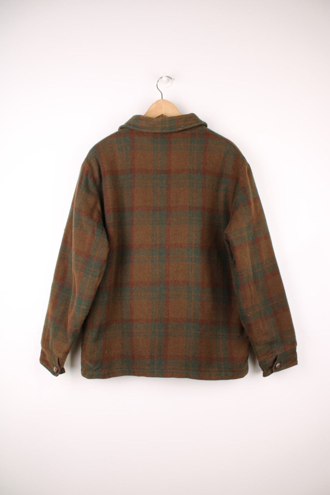 Woolrich Plaid Jacket in a brown and green colourway, zip up with side pockets and has a sherpa lining. 