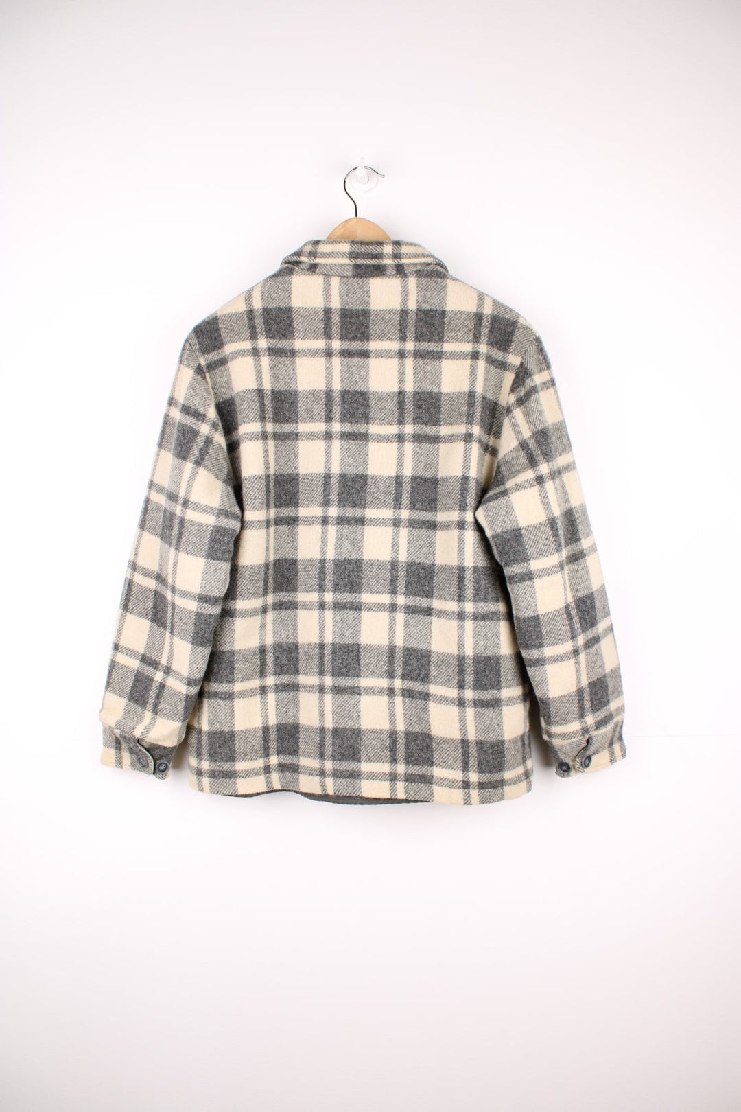 Woolrich Plaid Wool Jacket in a grey and white colourway, zip up with side pockets, and has a sherpa lining. 