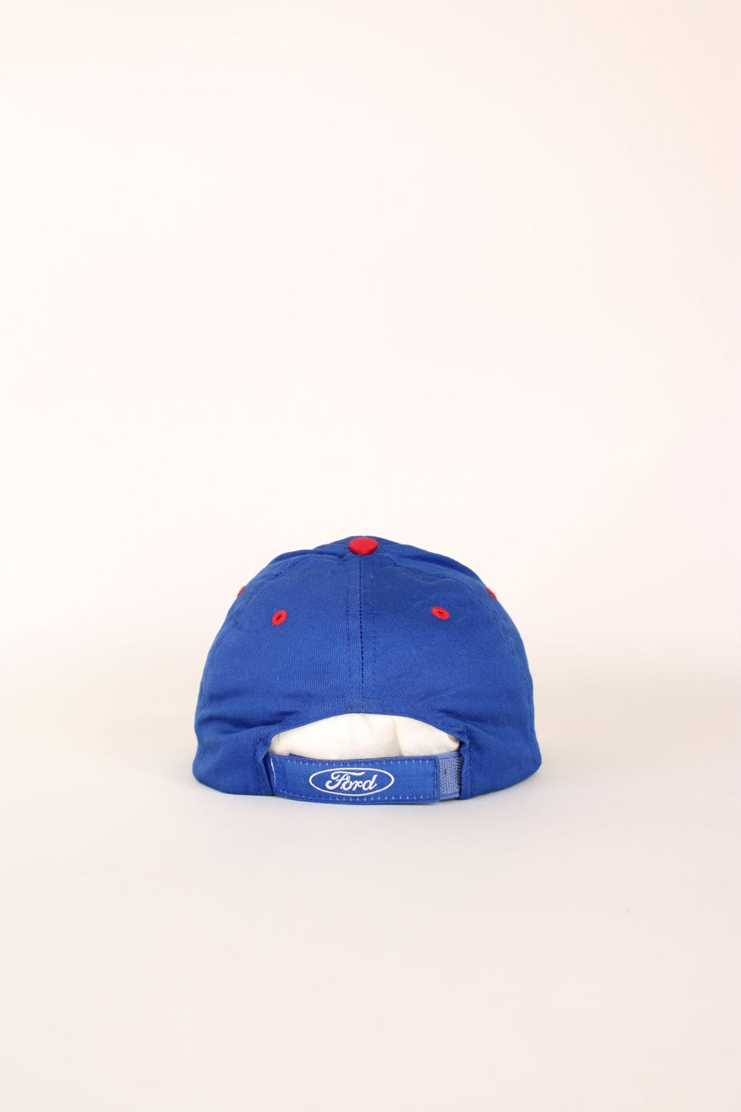 Ford Racing Cap in a blue and red colourway with the spell out logo embroidered on the front, and has a adjustable velcro strap. 