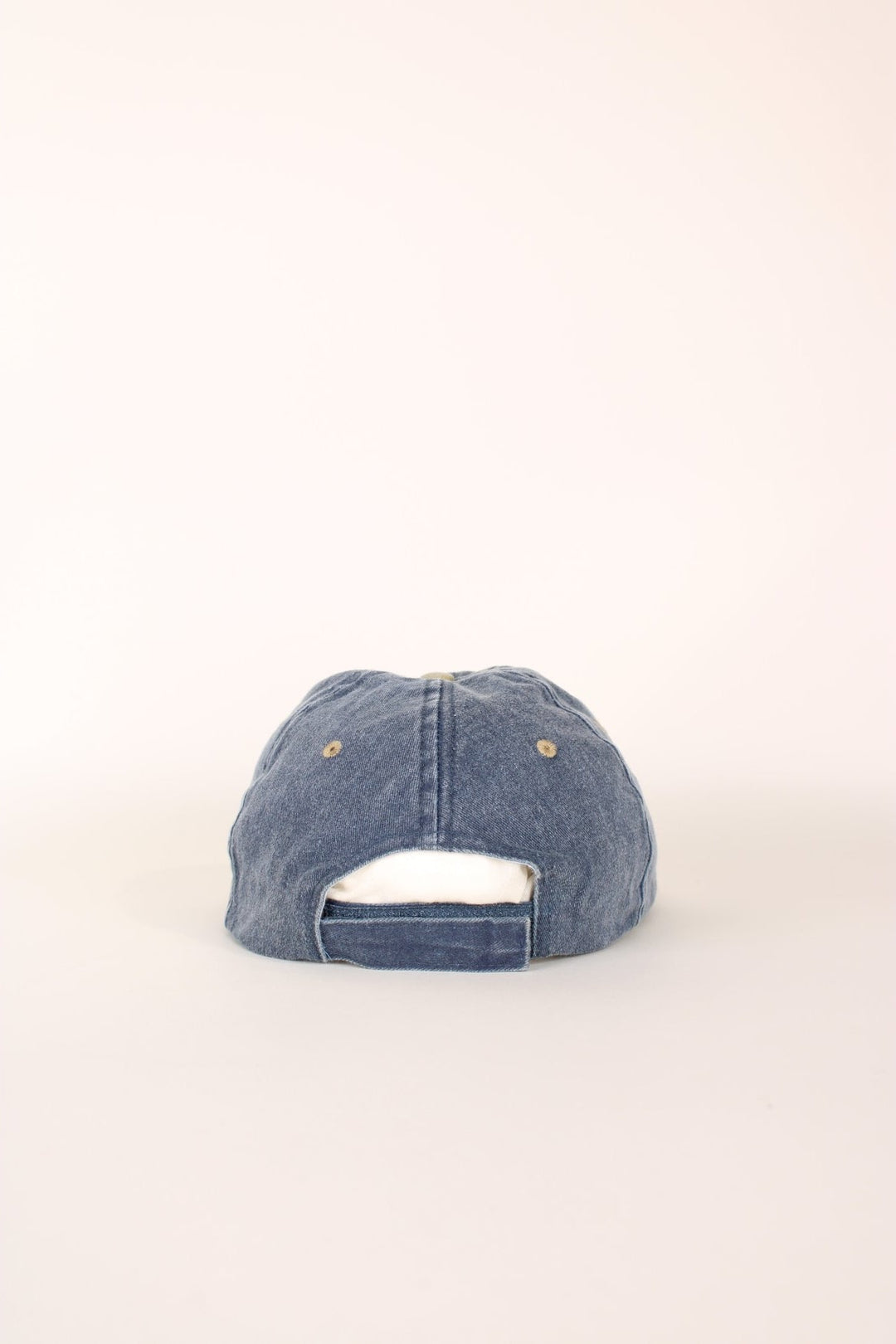 Anna Maria Island Florida Cap in a faded blue and tanned colourway with the spell out logo embroidered on the front, and has a adjustable velcro strap.